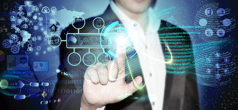 Man in suit using touch screen featuring software development abstract image. 